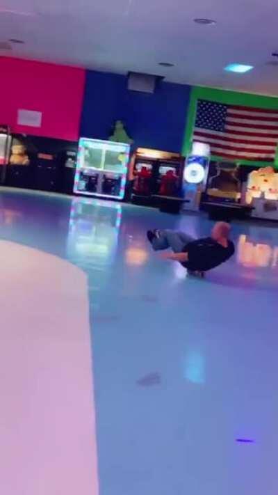 Dad flexin at the roller rink