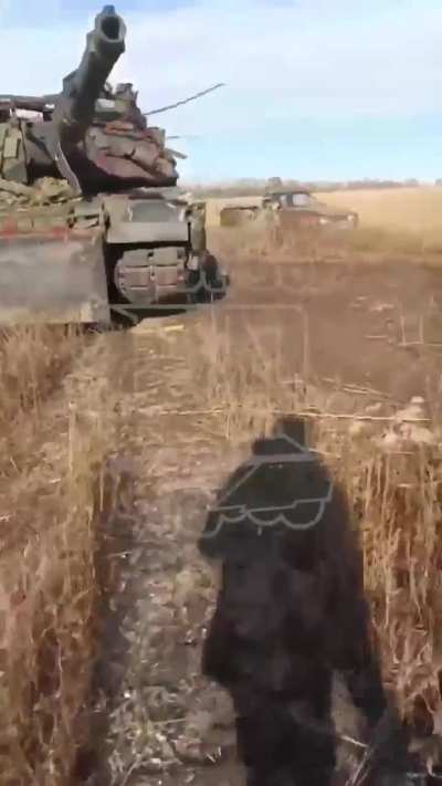 Russians inspect an abandoned Ukrainian Abrams tank around Pokrovsk - October 2024