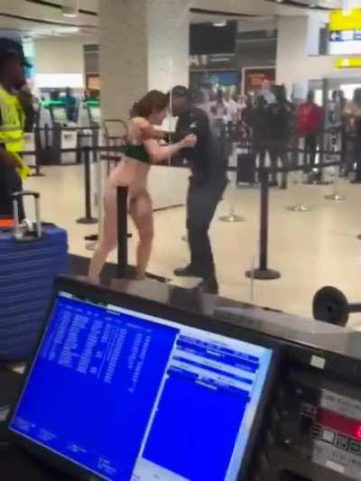 Woman Strips Naked at Jamaica Airport, Gropes a Police Officer, Flashes Everyone and asks cops to tase her on her genitals 🤮