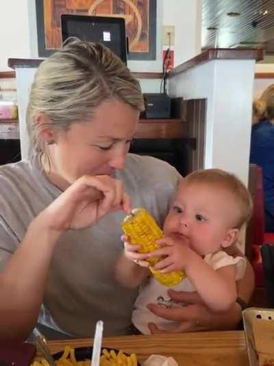 Infant not ready to share corn