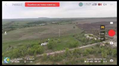 Russian Su-25 flies extremely close to a Russian drone near Ukrainian positions. April 2024