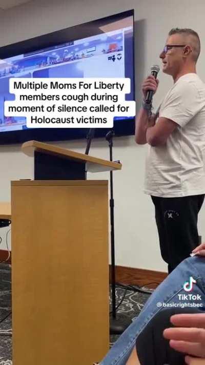 Moms For Liberty interrupts a moment of silence for the Holocaust and has a man escorted out by security for calling them out