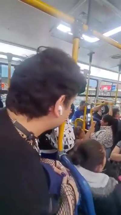 Christian woman harasses a man for wearing a skirt and makeup while riding a bus in Bogotá, Colombia 