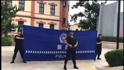 Chinese police drill for the A4 blank paper protest looks like a street magic show