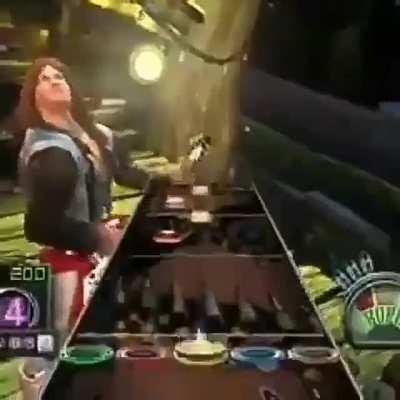 cachorro trans jogando guitar hero ao som de brega funk