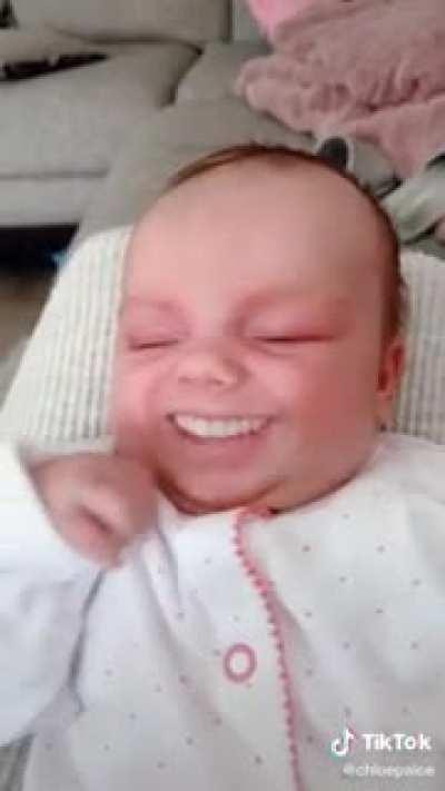 grinning filter on a baby