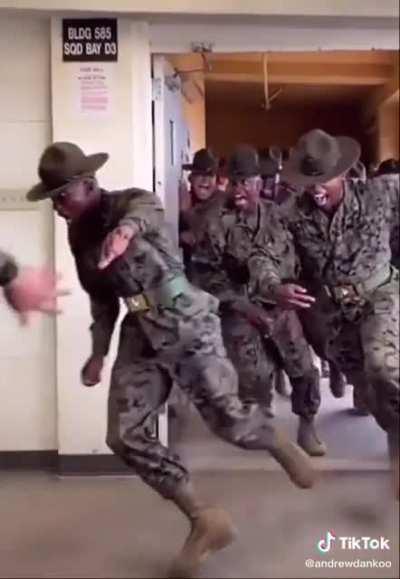 USMC Drill Instructors coming to meet new recruits