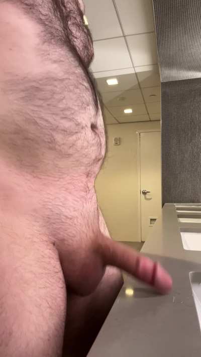 Masturbating in a public bathroom 