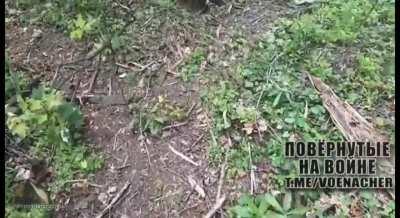 Ukrainian soldiers moving through woods hit by artillery, viewed from two angles + subtitles