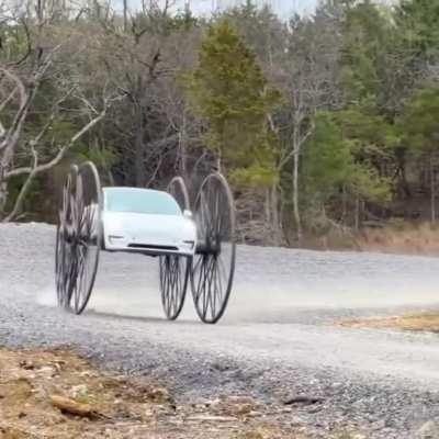 A car with a bigass wheels for tyres