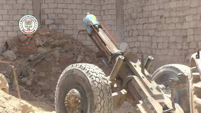 FSA 16th Division &quot;Hell Cannon&quot; strikes on a school converted into a Syrian Army fighting position - al-Khalidiyah Neighborhood, Aleppo - 4/30/2015