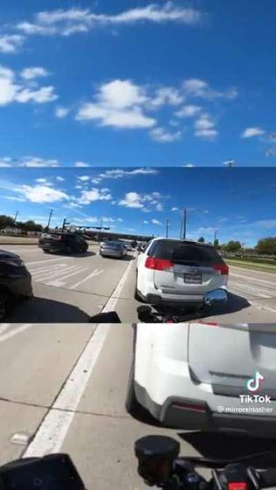 Guy hysterical after drawing smiley face on car window