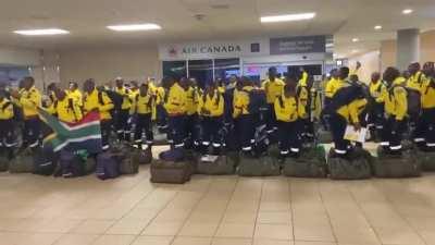 A Powerful Scene Of Humanity Plays Out As 200+ Brave South African firefighters landed in Edmonton, Canada to assist in the fight against the raging wildfire