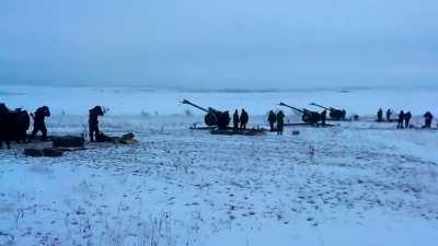 Separatist D-30 Howitzer unit lays down a barrage on Ukrainian positions during the fighting in Donbass - 2015