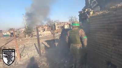 A Ukrainian soldier hits a Russian BMP with a rocket on the outskirts of Bakhmut