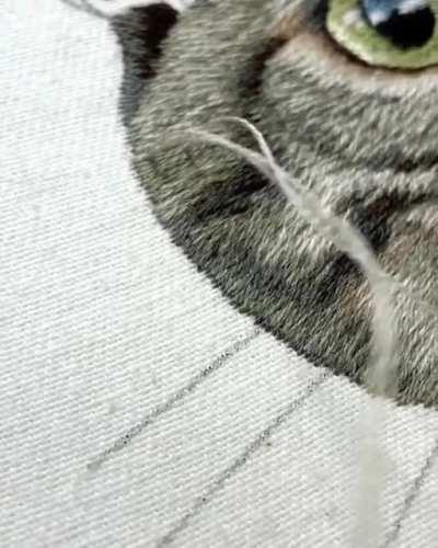 This tabby cat embroidery took 50+ hours and thousands of tiny stitches