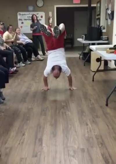 Break dancing at special needs home.