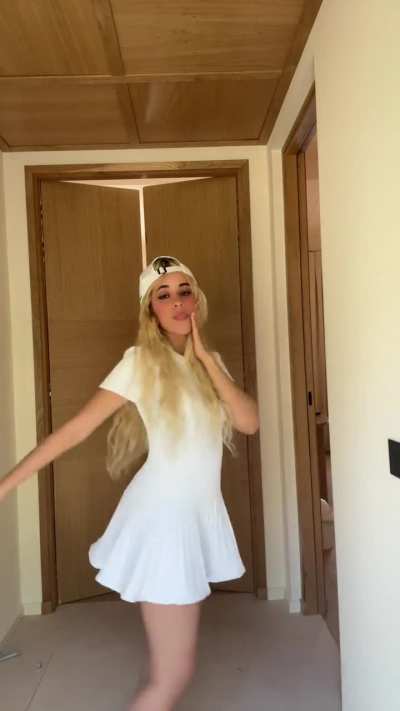 Camila dancing while wearing white dress | TikTok 7/22/24