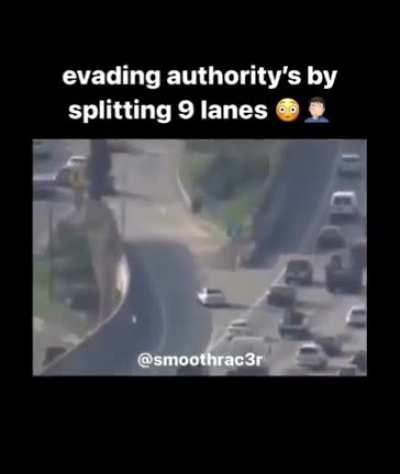 Escapes cops by splitting 9 lanes :0