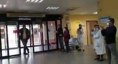 Taxi driver in Spain, known for taking patients to the hospital for free, is welcomed with a standing ovation and an envelope of cash.