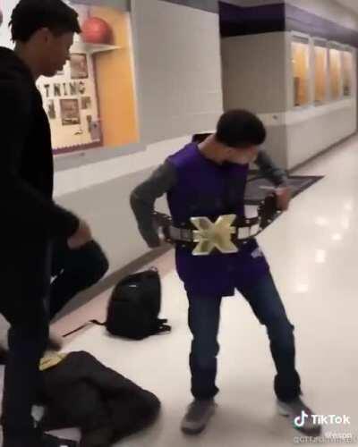 This kid gave his classmate a WWE belt my heart is melting