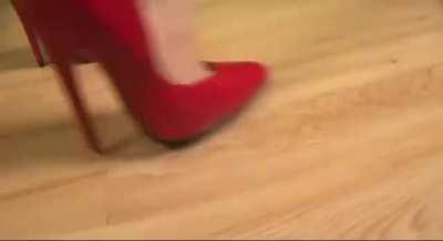 Angel crush roaches in red stiletto pumps