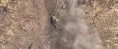 Ukrainian drone drops grenade on Russian soldier, exploding his head in a red cloud