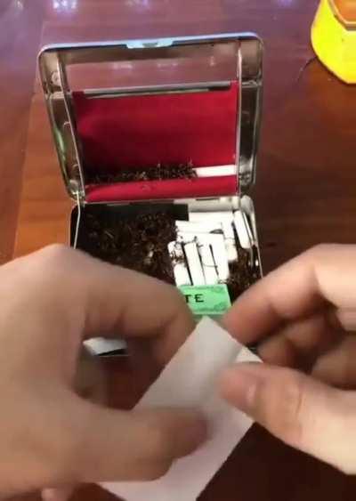 A cigarette rolling case