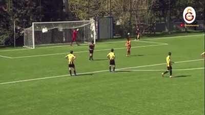 This soccer player accidentally tripped himself but was given a penalty. He intentionally missed the shot.