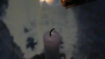 Relighting a candle with its fumes.