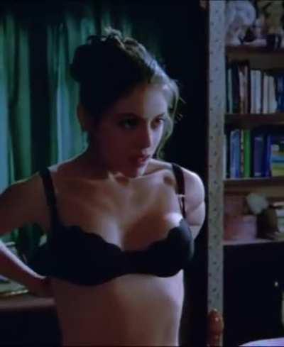 Alyssa Milano stripping