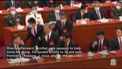 New footage emerges of former Chinese leader Hu Jintao minutes before he was escorted