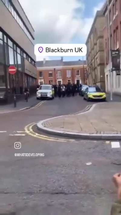 A masked islamofascist mob called the &quot;Muslim patrol&quot; marching in Blackburn UK