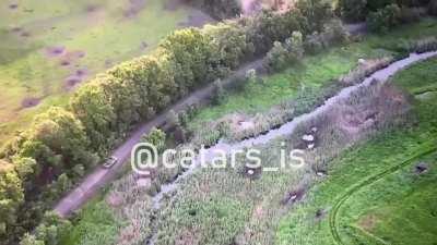 A Ukrainian Army reconnaissance drone recorded video of a Russian Army BMP ditching its crew during an unsuccessful counteroffensive towards the Zaporozhye region.