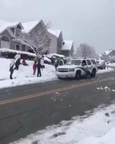 Kids started throwing snowballs to police car. Police answered back