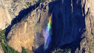 High winds at the perfect time of day created a previously undocumented 2,400 foot rainbow waterfall in Yosemite National Park