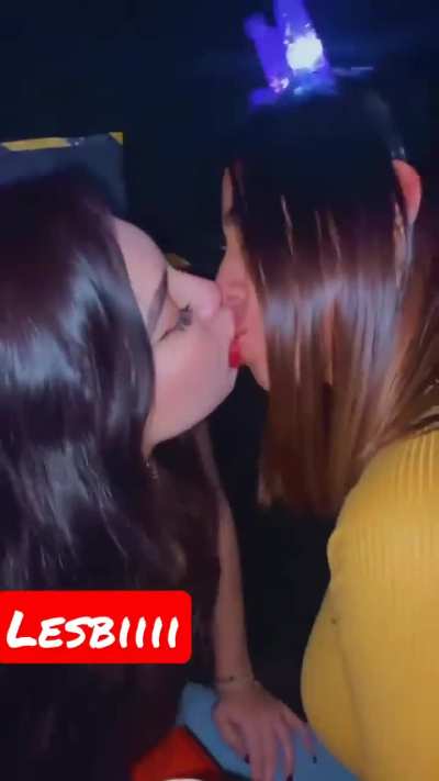 Girls kissing at the club