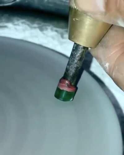 Making a gemstone from a broken piece from a bottle.