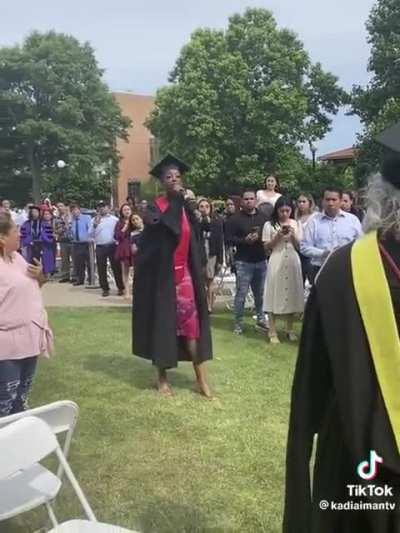 Graduate steals the mic and causes a scene.