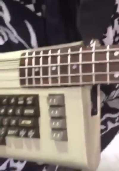 Girl turns c64 into a base guitar