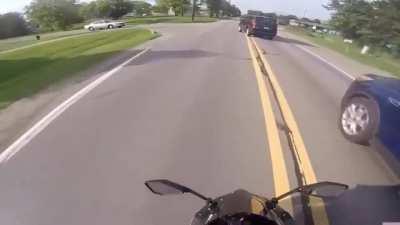 Bike cutting through traffic