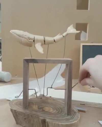 Wooden whale kinetic sculpture