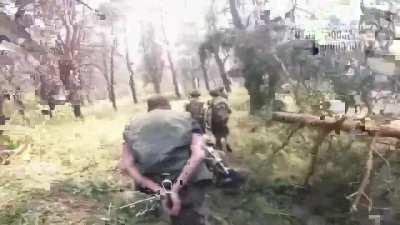 Ukranian SOF from the &quot;Lukas Squad Company&quot; evacuating Russian POWs come under small arms fire from Russians. 2 are KIA including the cameraman. (shooting starts at 0:40)