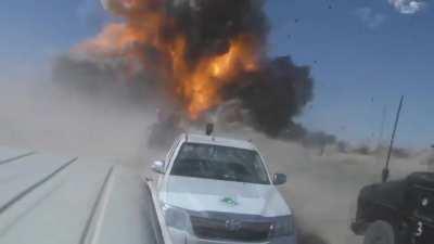 A VBIED explodes in the middle of an Iraqi convoy.