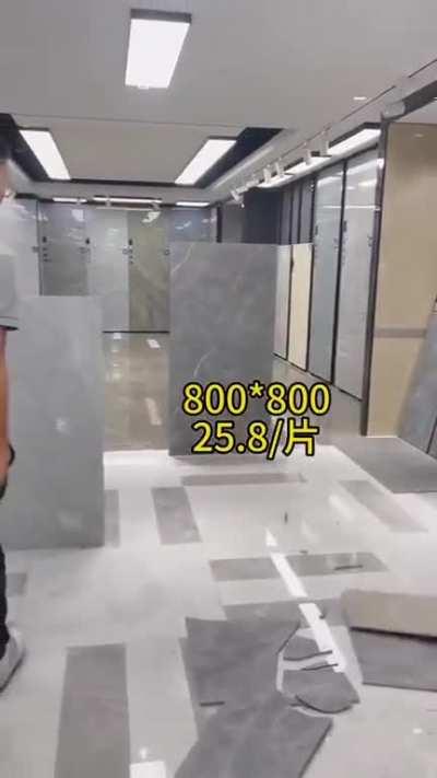 man sells tiles to hammer