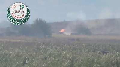 Opposition ATGM team successfully engages an SAA tank outside of Aleppo - 10/28/2013