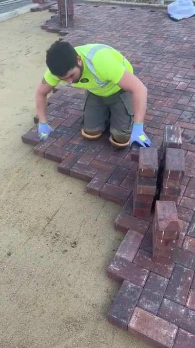 Brick laying on the ground