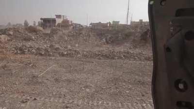 Peshmerga fighter is shot and wounded by ISIS. Bashiqa, Iraq 2016.