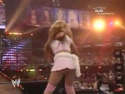 Marking 1,000 posts with the classic Wrestlemania 22 moment between Mickie and Trish