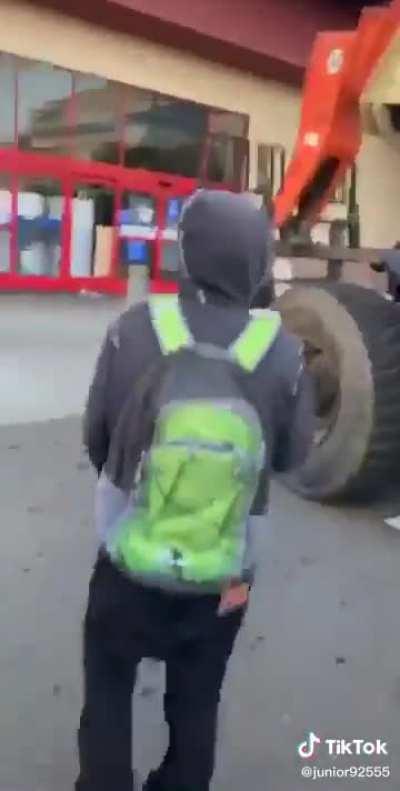 Using a stolen forklift to bash through BestBuy